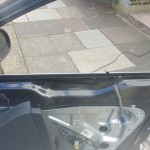 volkswagen tiguan door glass before replacement 2